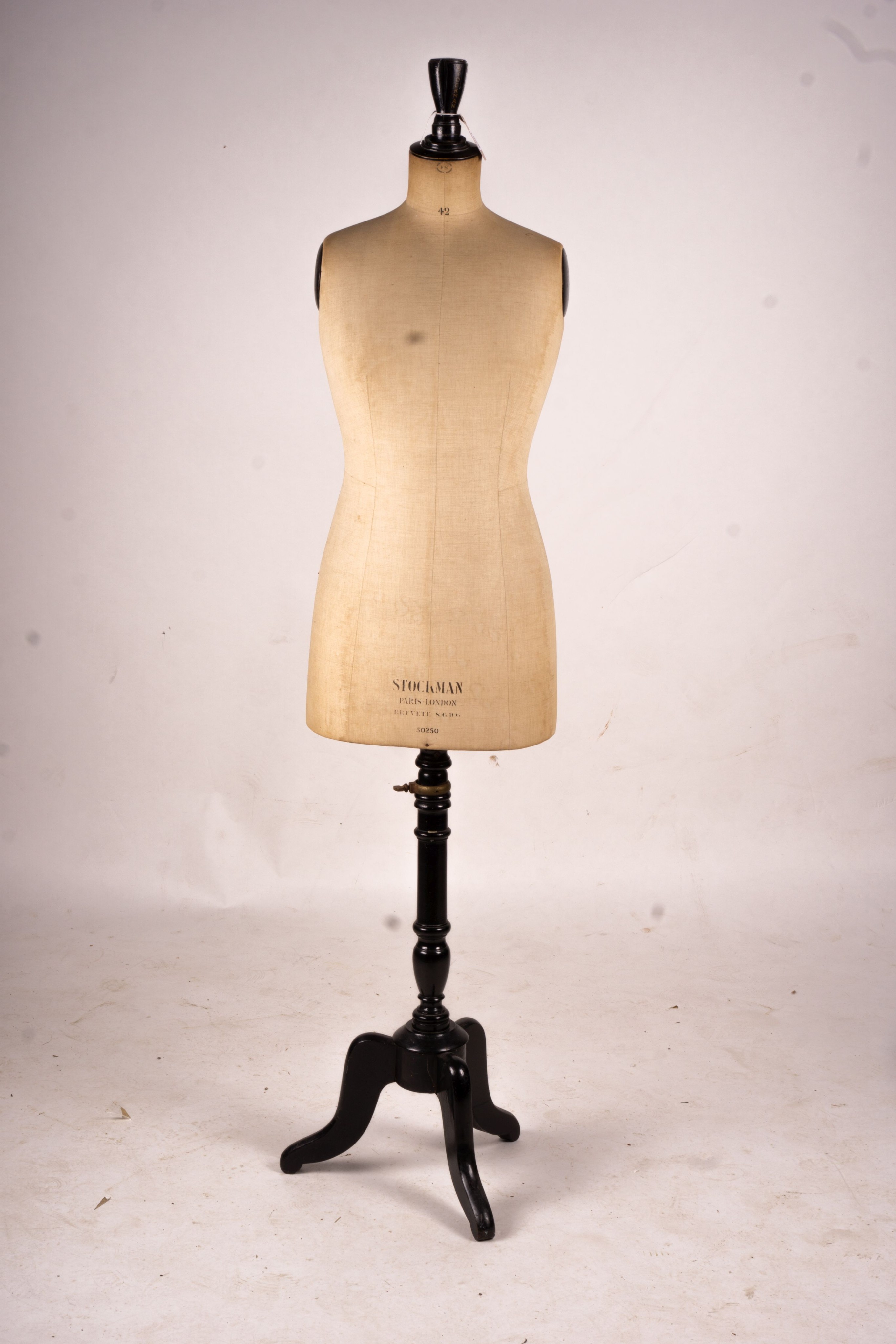 A Stockman tailors dummy on tripod stand, height 164cm